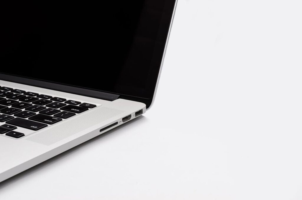 white background and white laptop is placed
